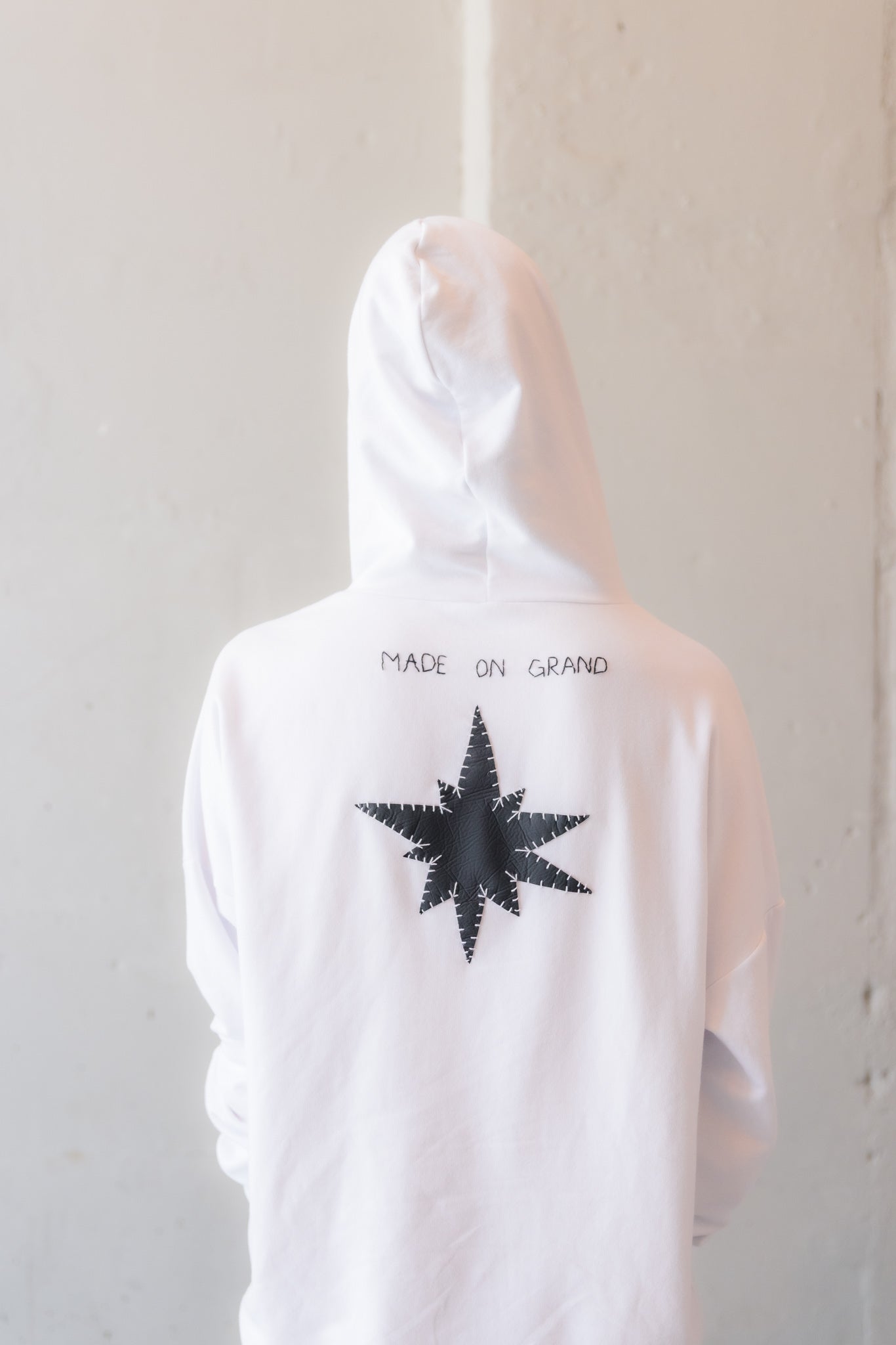 White Hooded Sweatshirt with Star Appliqué